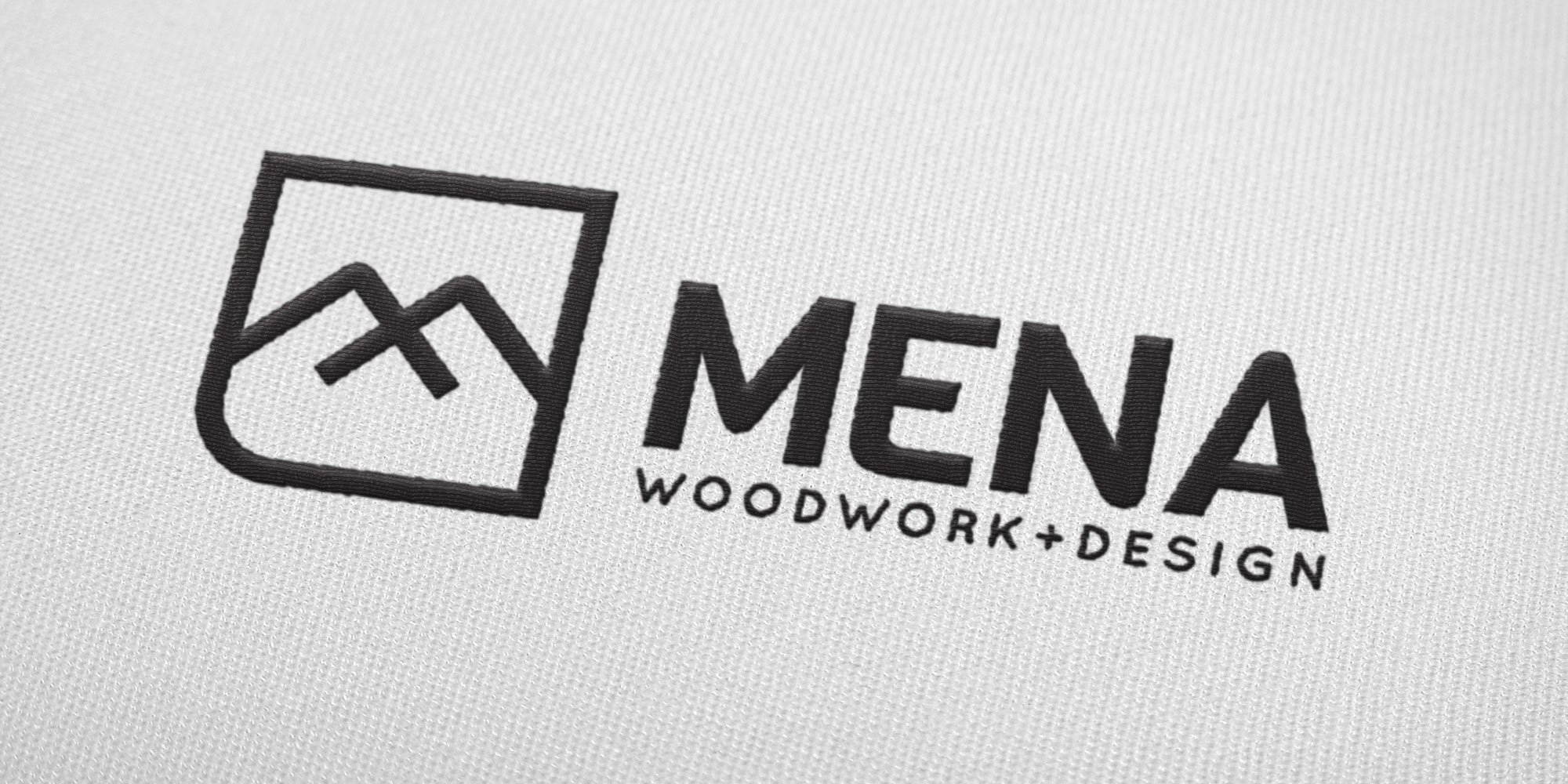 Mena Woodwork Logo Design on a Tshirt